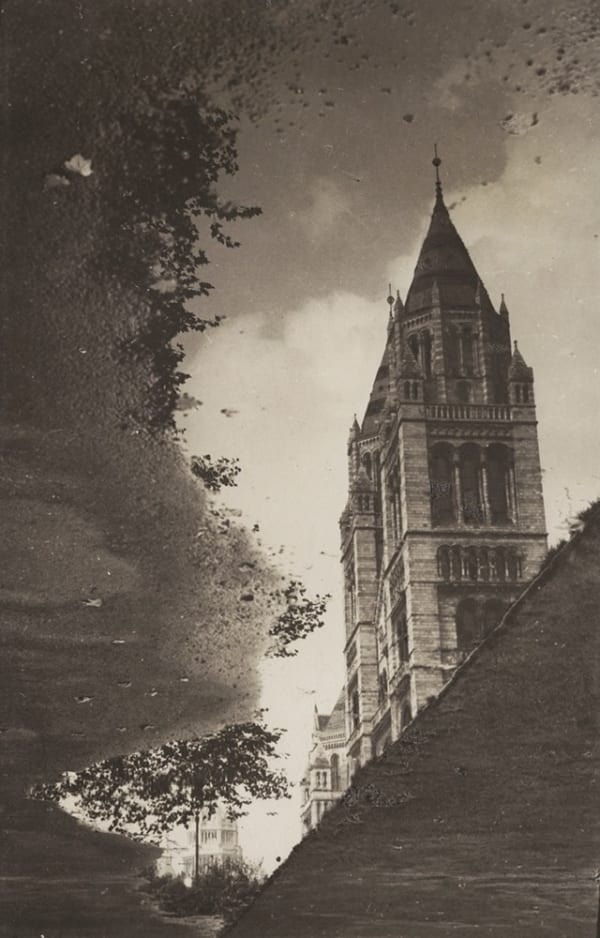 Emil Otto Hoppé, Reflections in the Pavement, South Kensington Museum, 1925