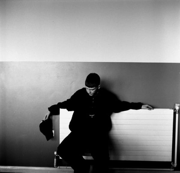 Ken Grant - Boy outside headmaster's office, Moreton, c2000