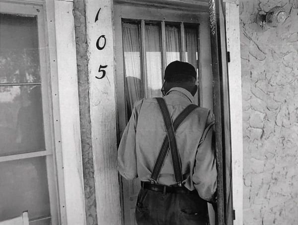 Uncle March Fourth McGowan entering his home, New Brockton, Alabama