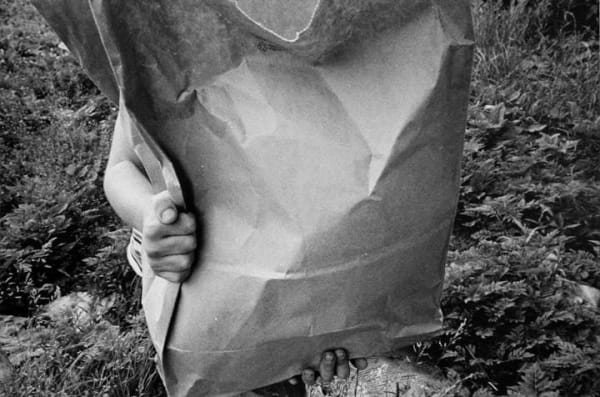 Mark Cohen, Boy Behind Big Bag, 1974