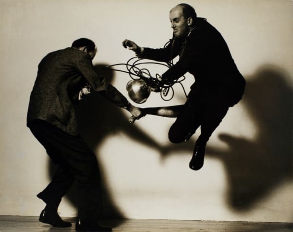Beaumont Newhall and Ansel Adams Jumping in B. Morgan's Studio