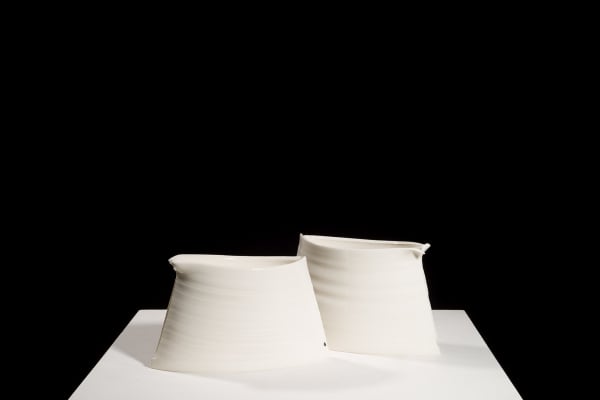 Carina Ciscato, Pair of bags with a side tear