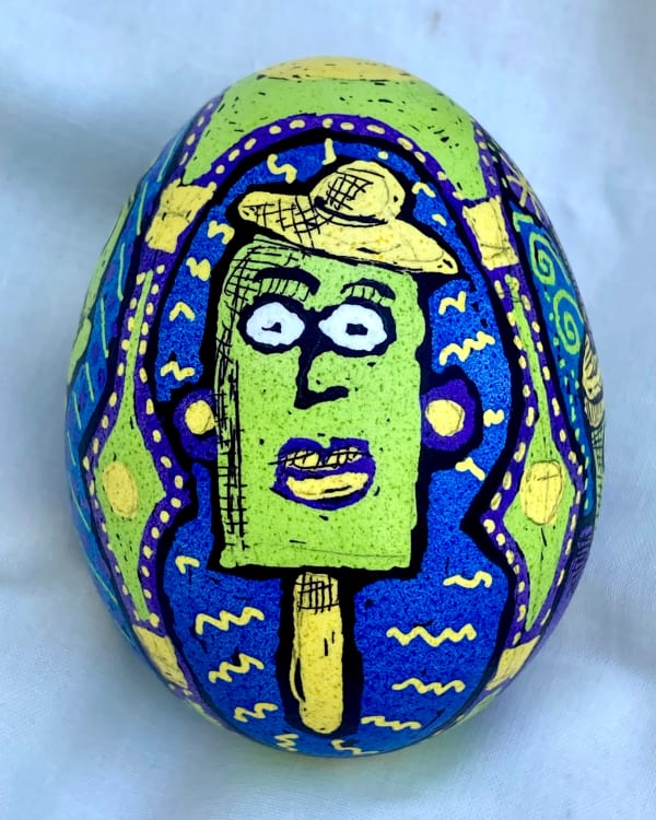 dyed egg showing green ice cream bar with hat