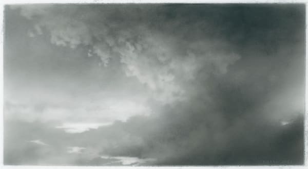 charcoal drawing of clouds and landscape