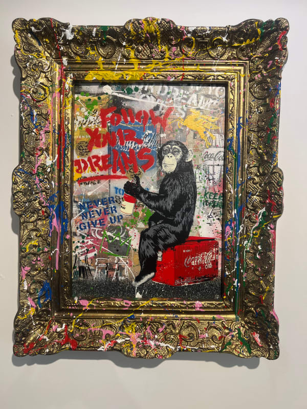 “EveryDay Life”, mixed media by Mr. Brainwash artist from France, based in L.A. Available at Carousel Fine Art West Palm Beach. The artist’s technique uses stencils to create subjects like Einstein, chimpanzees, and Charlie Chaplin. He then adds color sketches and writings, including the motto Life is Beautiful. His work blends pop art's history with the raw energy of street art. Colors of this work : Blue, Red, Pink, Yellow, Orange, Green, Pink, Beige, Grey, White, Black
