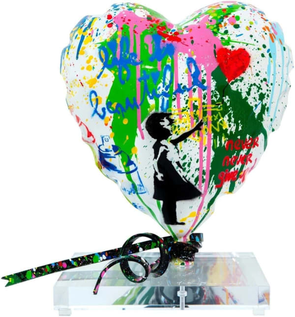 “Balloon Heart”, sculpture by Mr. Brainwash artist from France, based in L.A. Available at Carousel Fine Art Chicago. The artist’s technique uses Stencil and Mixed Media on 10" Fiberglass Sculpture and Acrylic Base, including the motto Life is Beautiful. His work blends pop art's history with the raw energy of street art. Colors of this work : Blue, Green, Red, Pink, Yellow, Orange, Pink, White, Black
