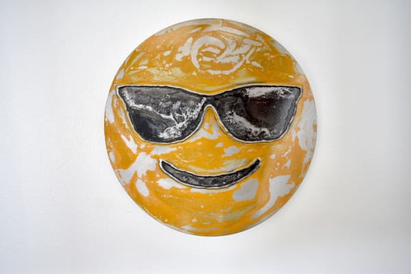 Smiling face with shades
