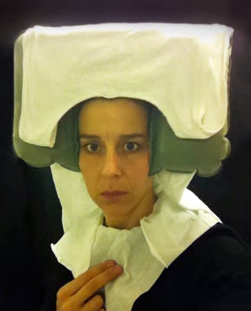 Nina Katchadourian, Lavatory Self-Portrait in the Flemish Style #11 ("Seat Assignment" project, 2010--ongoing), 2011