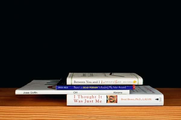 Nina Katchadourian, Between You and I from the series Family Gathering, 2013 ("Sorted Books" project, 1993-ongoing), 2013