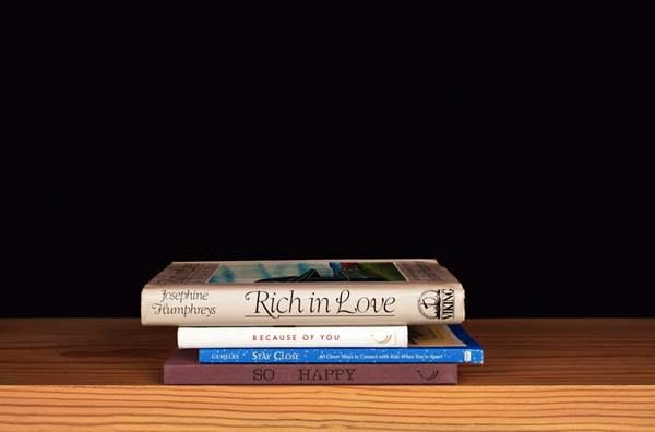 Nina Katchadourian, Rich in Love from the series Family Gathering, 2013 ("Sorted Books" project, 1993-ongoing), 2013