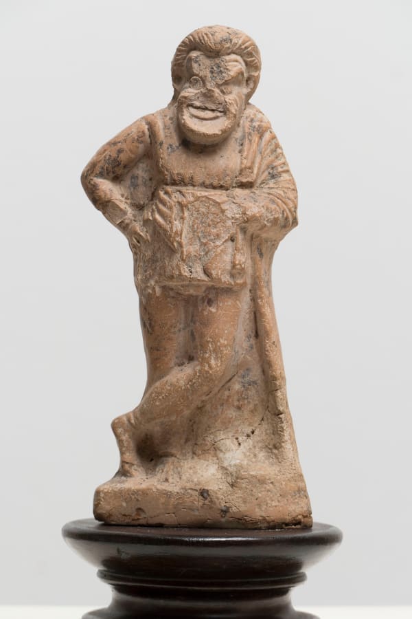 TERRACOTTA FIGURINE OF A COMIC ACTOR, Greece, c. 350 B.C.