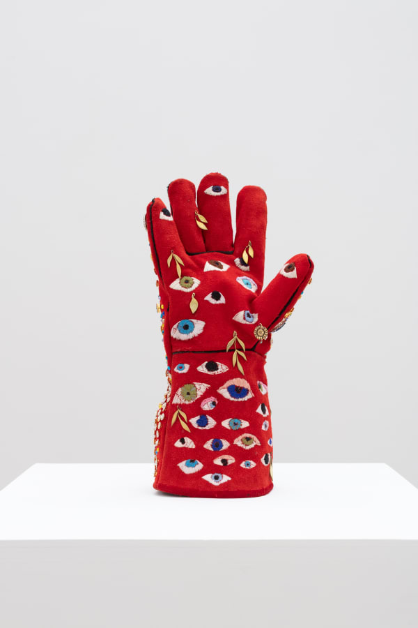 Fátima Rodrigo Ejercicios de resistencia [Exercises in resistance], 2024 Leather suede work glove, embroidery, plastic, glass and metal gems 34 x 15 x 11 cm 13 3/8 x 5 7/8 x 4 3/8 in Series: Ejercicios de resistencia