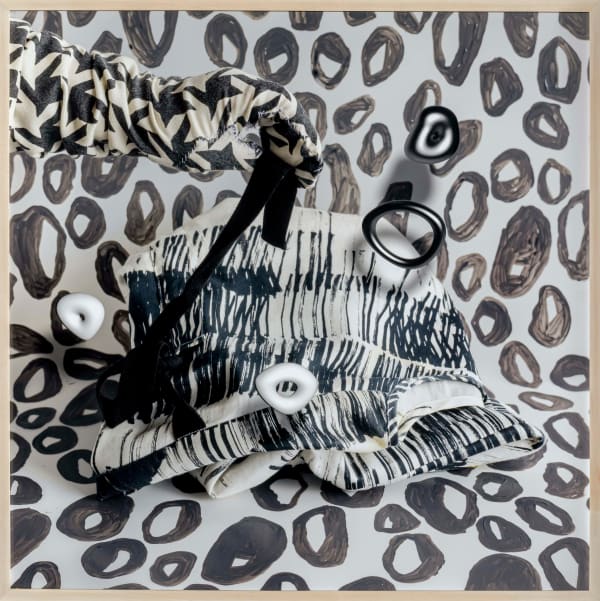 Michelle Forsyth, Black and white glove with floating rings, 2022
