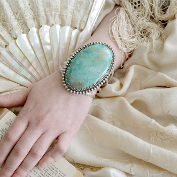 Jill Garber, GRANDE LARGE DEEP AQUA BLUE/ GREEN, HIGH DOME CERRILOS TURQUOISE CABOCHON CUFF BRACELET WITH EXQUISITE GALLERY WIRE MOUNTING AND BOLD STERLING SILVER BEADING