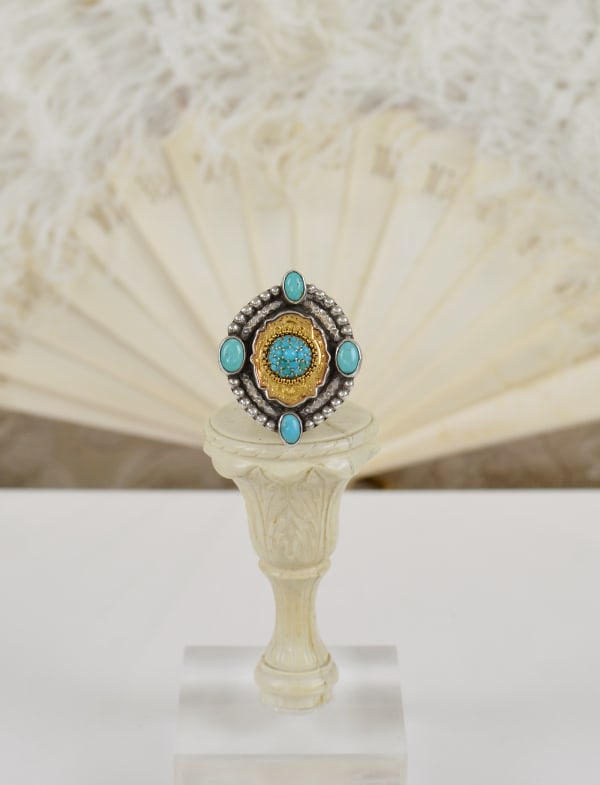 Jill Garber, OVAL 18 KT PERSIAN TURQUOISE DOME IN STERLING SILVER RING