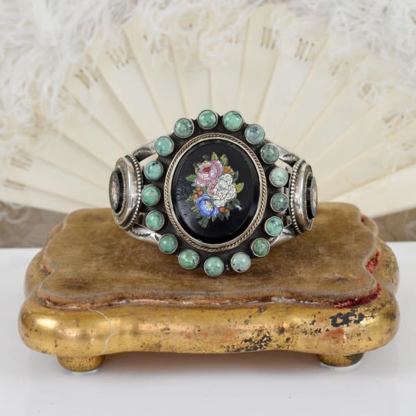 Jill Garber, Very fine recessed in black jet 19th Century tesserae micro mosaic cuff bracelet with green Royston turquoise surround