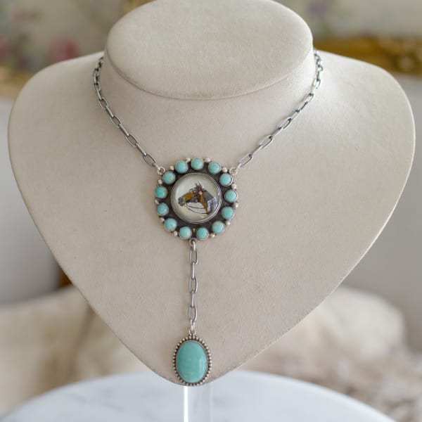 Jill Garber, A fabulous lingerie necklace comprised of an original early 20th Century English intaglio depicting a horses head rendered in shades of brown, and black, reverse painted within crystal