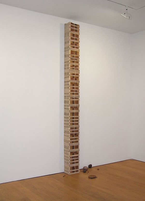 William Cordova Untitled (Lumumba-zapata), 1969-2009 3,000 bundled newspapers, reprinted photographs, stones, gourds overall dimensions variable