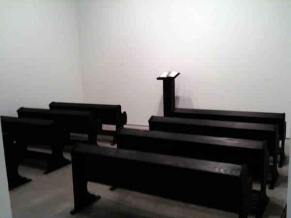 Ciprian Mureșan Incorrigible Believers, 2009 8 wooden pews, wooden podium and book dimensions variable