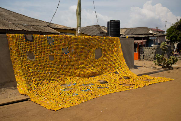 Serge Attukwei Clottey Act of kindness, 2019 Plastics and copper wires 192 x 264 in 487.68 x 670.56 cm