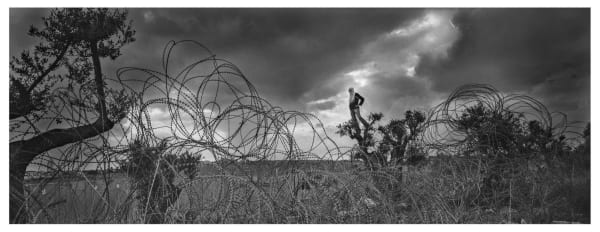 Pavel Wolberg, West Bank Palestinan boy watch at Israeli police, 2010