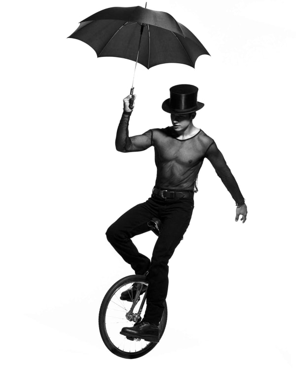 Albert Watson, Man on Unicycle with Umbrella, New York City, 1994