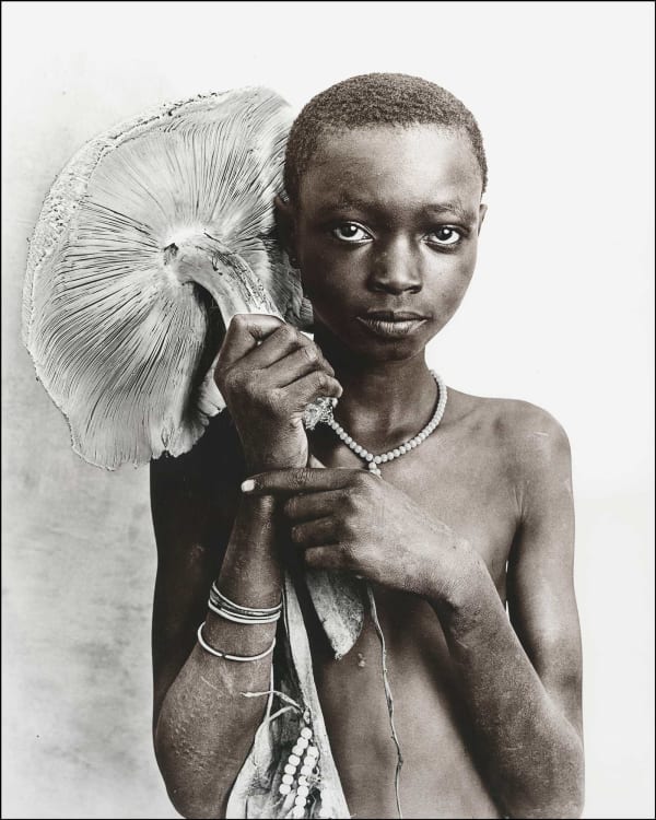 Jan C. Schlegel, Suri tribe girl with mushroom, Ethiopia, 2017