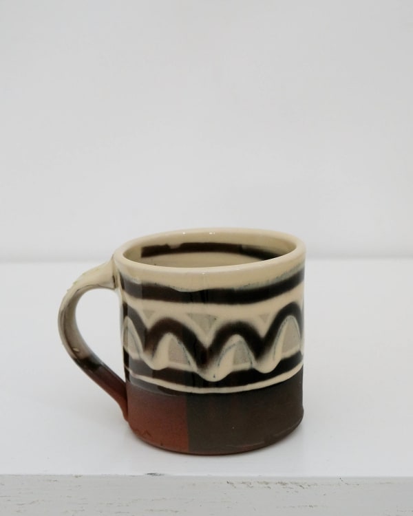 Camille Biddell, Mug IV