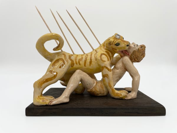 Amata Benedict, Lion Devouring Young Man Toothpick