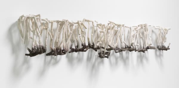 Fractured Margin, 2022 table salt, sand, paper board, white glue, pigment-based ink 10.5 x 62.5 x 6"