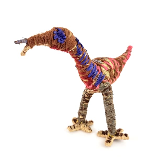 Erica Shorty Tjulpu (Bird), 2022 tjanpi (grass), acrylic wool, raffia 23 x 23 x 17 cm 9 1/8 x 9 1/8 x 6 3/4 in