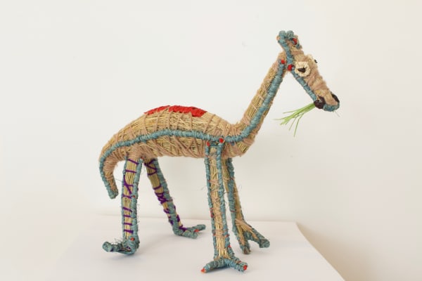 Danielle Cooley Kamula (Camel), 2022 tjanpi (grass), acrylic wool, raffia 24 x 37 x 16 cm 9 1/2 x 14 5/8 x 6 1/4 in