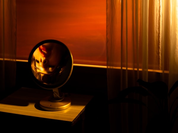 Tania Franco Klein, Rounded mirror, mirror, window (self-portrait), 2022