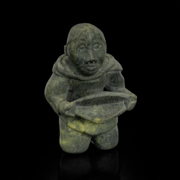 Lot 8 KIAKSHUK (1886-1966) KINNGAIT (CAPE DORSET) Kneeling Woman with Quilliq (Kudlik), c. 1960-63 stone, 7.25 x 4.75 x 3 in (18.4 x 12.1 x 7.6 cm) ESTIMATE: $3,000 — $5,000