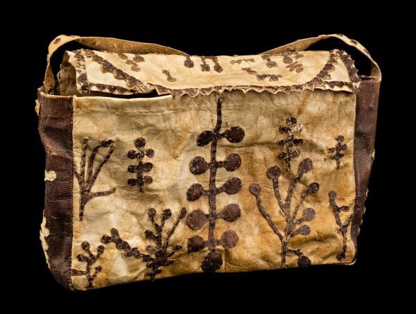 Lot 46 KENOJUAK ASHEVAK, C.C., R.C.A. (1927-2013) KINNGAIT (CAPE DORSET) Sealskin Handbag, c. 1956-57 bleached and unbleached sealskin, fabric lining, and sinew, cotton thread, 7.5 x 11 x 4.25 in (19.1 x 27.9 x 10.8 cm) ESTIMATE: $15,000 — $25,000 PRICE REALIZED: $16,800.00