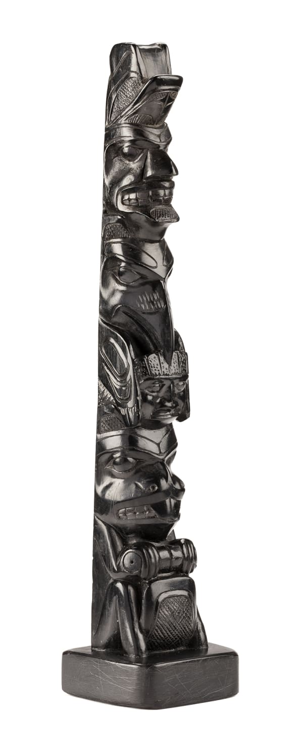 Lot 47 Attr: PAUL JONES (c. 1847-1927), TANU / SKIDEGATE, HAIDA GWAII Model Totem Pole, c. 1890-1900 argillite, 9 x 2 x 2 in (22.9 x 5.1 x 5.1 cm) ESTIMATE: $3,000 — $5,000 Price Realized: $3,840