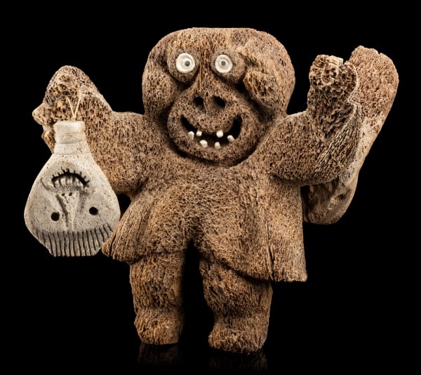 Lot 49 JUDAS ULLULAQ (1937-1999) UQSUQTUUQ (GJOA HAVEN) The Shaman Who Could Fly, c. 1990 whale bone, sinew, and stone, 17 x 20 x 8 in (43.2 x 50.8 x 20.3 cm) ESTIMATE: $12,000 — $18,000 Price realized: $10,000.00