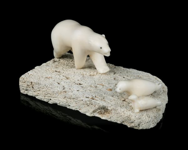 Lot 12 FABIEN OOGAAQ (1923-1992), KUGAARUK (PELLY BAY) Polar Bear Approaching Seal and Pup, early 1970s whale bone and ivory, 1.75 x 4 x 3 in (4.4 x 10.2 x 7.6 cm) ESTIMATE: $400 — $600 PRICE REALIZED: $366.00