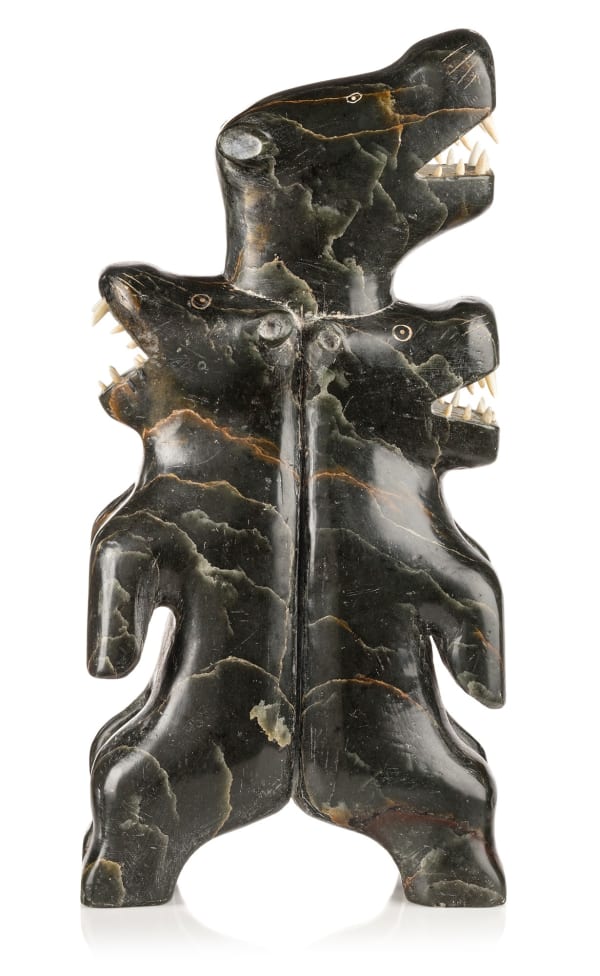 Lot 115 PROBABLY AMIDLAK (1897-1961) OR LEVI AMIDLAK (1931-1998/99) INUKJUAK (PORT HARRISON) Totemic Composition with Bears, c. 1953-4 stone and ivory, 10.5 x 5 x 3 in (26.7 x 12.7 x 7.6 cm) ESTIMATE: $10,000 — $15,000 PRICE REALIZED: $8,400.00