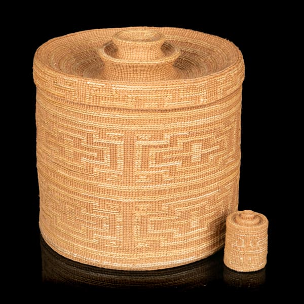 2 ISABEL RORICK (1955-) HAIDA, OLD MASSET, HAIDA GWAII Large and Miniature Rattle Top Baskets, c. 1990s woven spruce root and rattle filling, the larger: 6 x 6 x 6 in (15.2 x 15.2 x 15.2 cm)