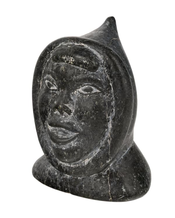 Lot 41 JOHNNY INUKPUK JR. (1930-1984) INUKJUAK (PORT HARRISON) Portrait of an Inuk with a Bright Smile, early-mid 1960s stone, 5 x 4.5 x 3.25 in (12.7 x 11.4 x 8.3 cm) ESTIMATE: $350 — $500 PRICE REALIZED: $146.40