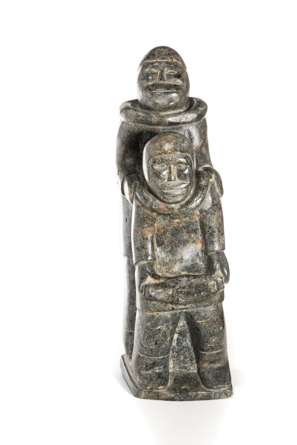 LOT 68 UNIDENTIFIED INUIT ARTIST, EASTERN CANADIAN ARCTIC Standing Father and Child with Kudlik, 1970s stone, 16.75 x 5.5 x 6 in (42.5 x 14 x 15.2 cm) ESTIMATE: $700 — $1,000 PRICE REALIZED: $600.00