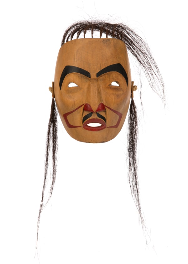 Lot 100 CHESTER (CHAZ) MCLEAN, GITXSAN (GITKSAN) Portrait Mask, 1976 wood, hair, pigment, and leather, 8 x 6.25 x 4 in (20.3 x 15.9 x 10.2 cm) ESTIMATE: $800 — $1,200 PRICE REALIZED: $780.00