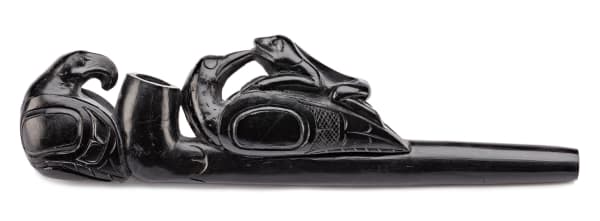 Lot 83 UNIDENTIFIED HAIDA ARTIST Late Trade Pipe, c. 1880-90 stone, 2.75 x 10.25 x 1.5 in (7 x 26 x 3.8 cm) ESTIMATE: $3,000 — $5,000 PRICE REALIZED: $4,080.00