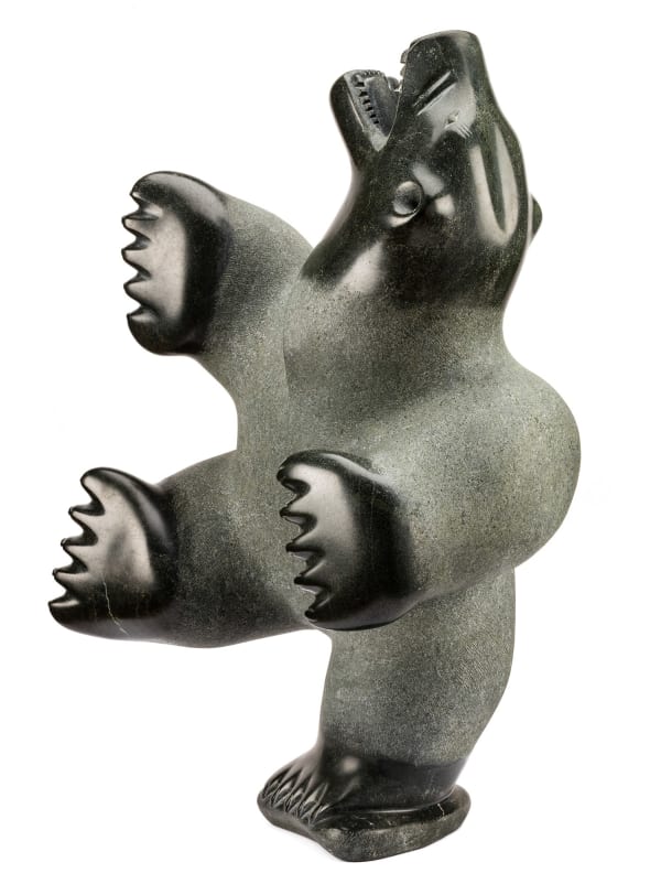 Lot 152 NALENIK TEMELA (1939-2003) KIMMIRUT (LAKE HARBOUR) Dancing Bear, 1988 stone, 27.5 x 16.5 x 16.5 in (69.8 x 41.9 x 41.9 cm) ESTIMATE: $20,000 — $30,000 PRICE REALIZED: $20,400.00
