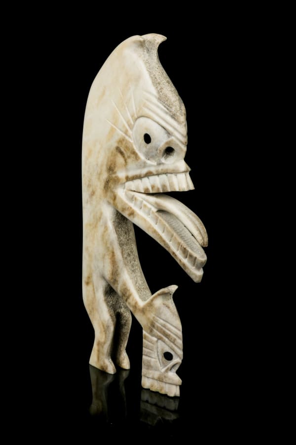 Lot 19 UNIDENTIFIED KALAALLIT (GREENLANDIC) ARTIST Tupilak, c. 1970s antler and black inlay, 5.25 x 2.5 x 0.5 in (13.3 x 6.3 x 1.3 cm) ESTIMATE: $250 — $350 PRICE REALIZED: $195.20