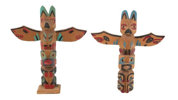 Lot 85 UNIDENTIFIED NUU-CHAH-NULTH ARTISTS Two Model Totem Poles, c. 1930s / 1940s each wood and acrylic paint, the first, 6.25 x 5.5 x 2.25 in (15.9 x 14 x 5.7 cm) / the second: 6 x 5.5 x 1.75 in (15.2 x 14 x 4.4 cm) ESTIMATE: $80 — $120 PRICE REALIZED: $61.00