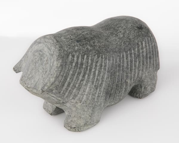 10 BARNABUS ARNASUNGAAQ (1924-2017) QAMANI'TUAQ (BAKER LAKE) Muskox, c. 2000 stone, 5.75 x 10 x 3.75 in (14.6 x 25.4 x 9.5 cm)