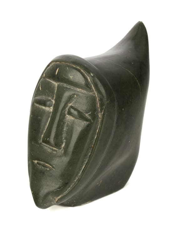 Lot 46 CONLUCY NIVIAXIE (1940-) INUKJUAK (PORT HARRISON) Head of a Happy Hooded Inuk, mid-late 1960s stone, 3.5 x 2 x 3.5 in (8.9 x 5.1 x 8.9 cm) ESTIMATE: $300 — $500