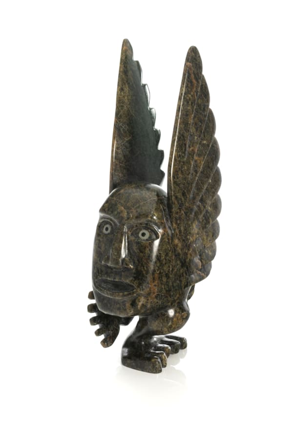 Lot 51 TOONOO SHARKY (1970-) KINNGAIT (CAPE DORSET) Winged Spirit, Chanting, 2006 stone, 11 x 2.75 x 5.5 in (27.9 x 7 x 14 cm) ESTIMATE: $800 — $1,200 PRICE REALIZED: $2,318.00